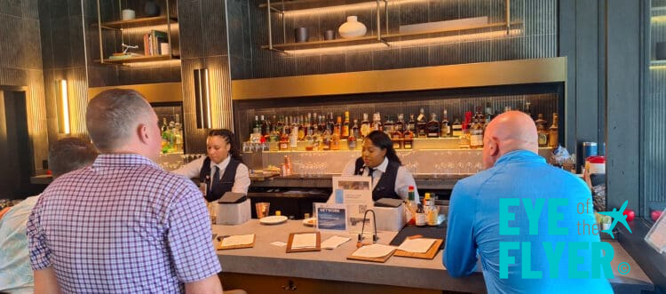 a group of people at a bar