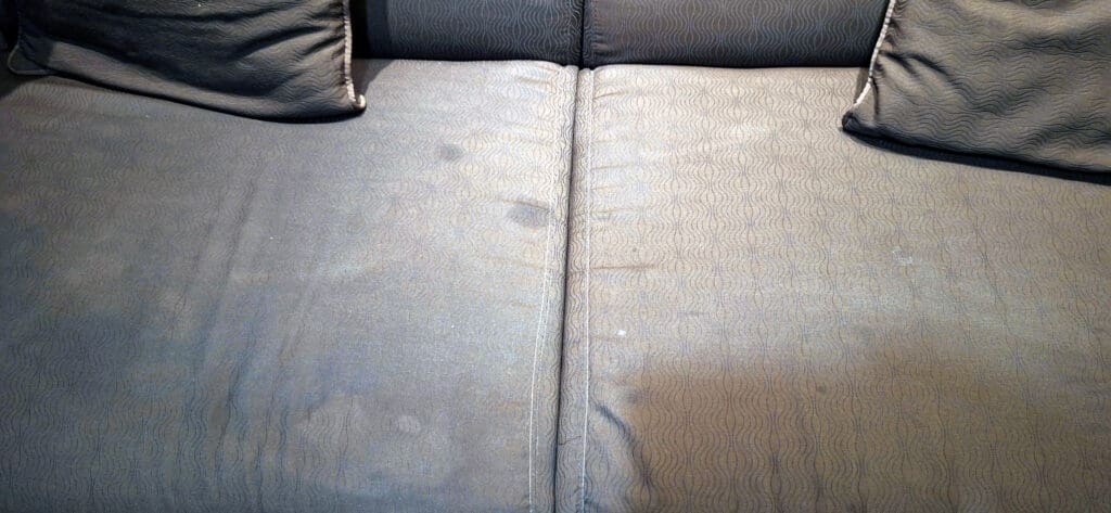 a couch with a stain on it