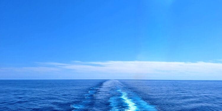 a wake of a boat in the ocean