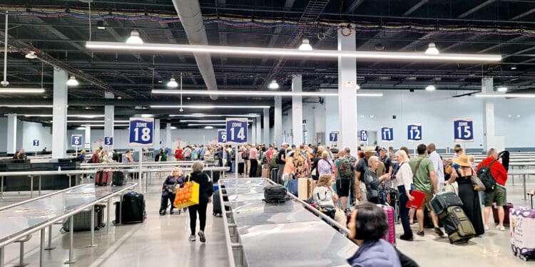 a group of people in an airport terminal