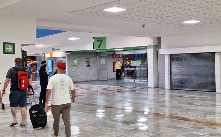 people walking in a large building