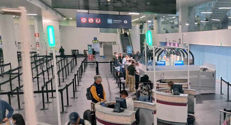 people at a check in counter