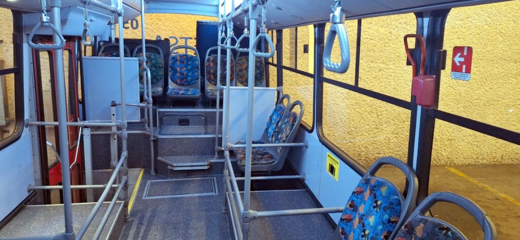 a bus with seats and handrails