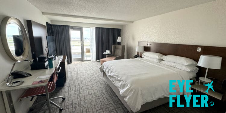 a room with a bed and a desk