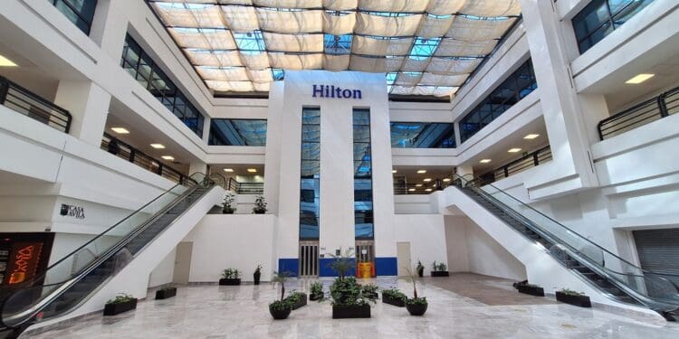 a building with stairs and a sign