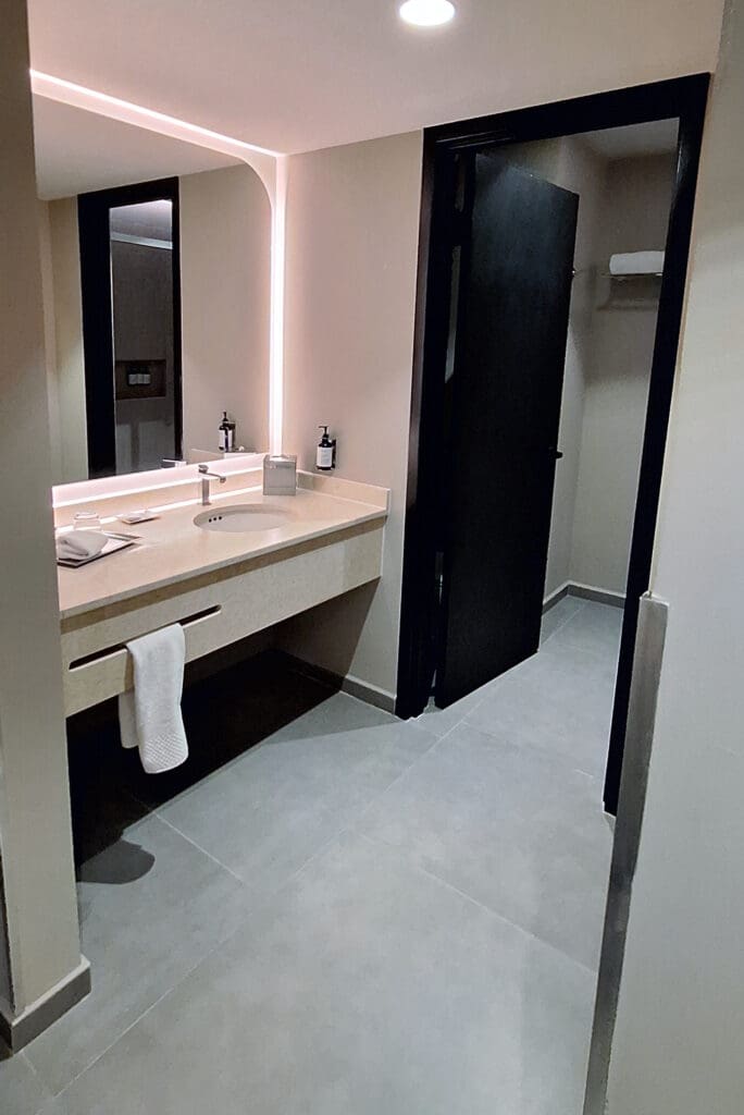 a bathroom with a black door