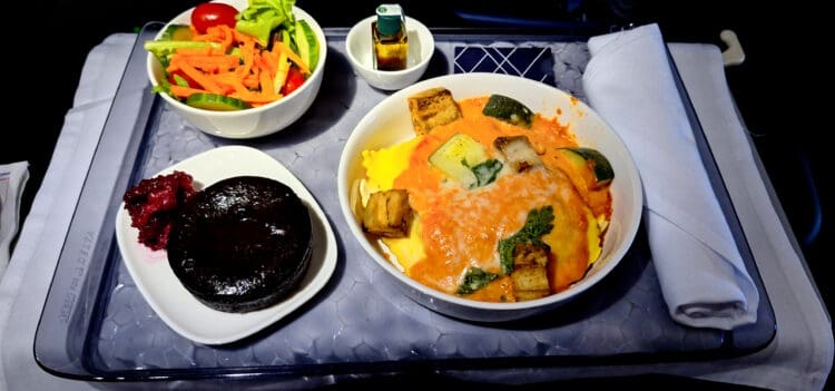 a plate of food on a tray