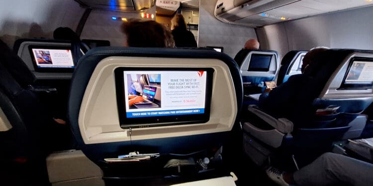 a screen on the back of an airplane