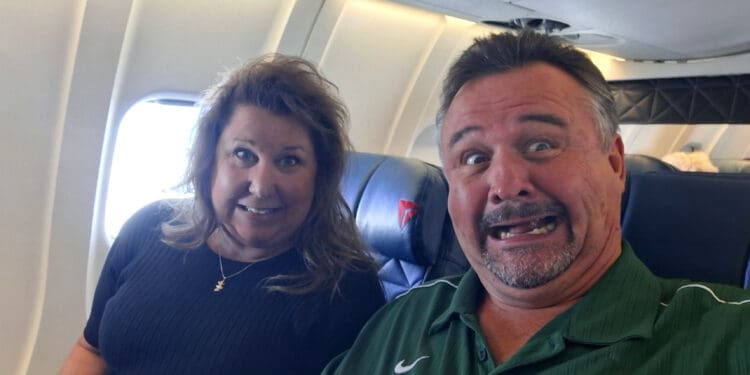 a man and woman taking a selfie