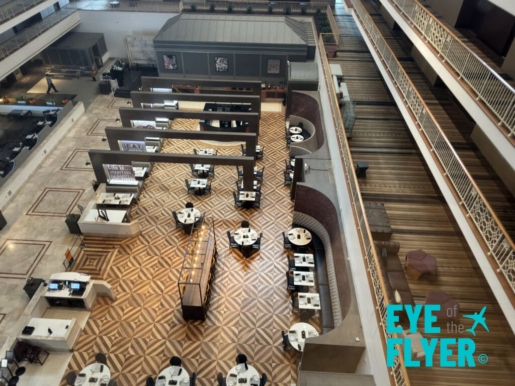 an empty restaurant with tables and chairs