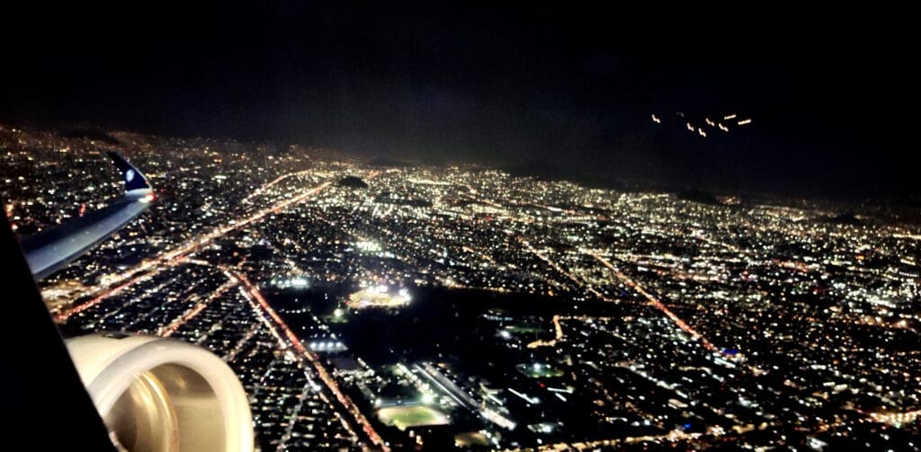 an aerial view of a city at night