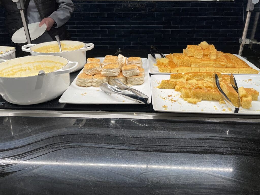 a buffet table with food on plates