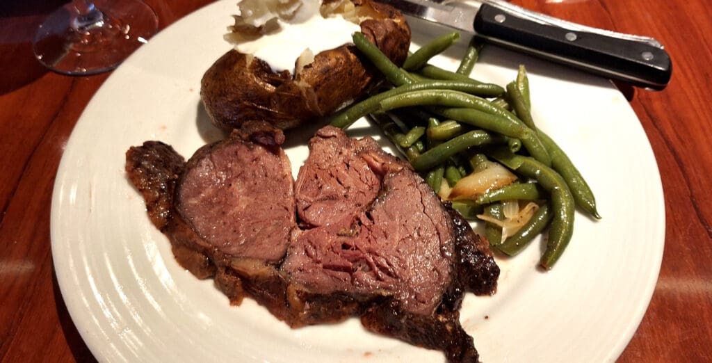 a plate of food with a knife and fork