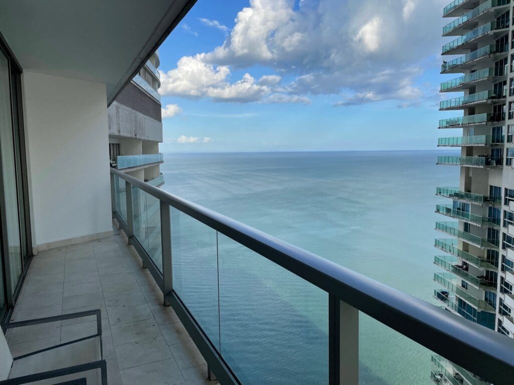 a balcony overlooking the ocean