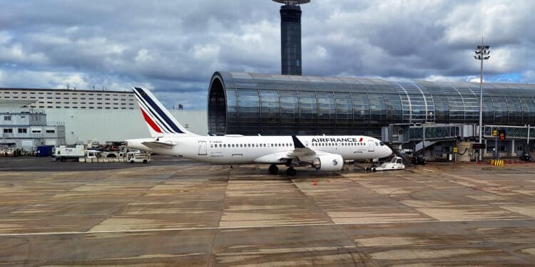 a white airplane on the tarmac