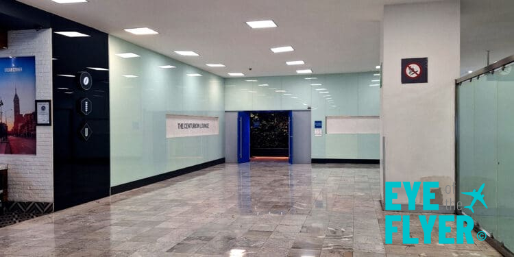 a hallway with a blue door