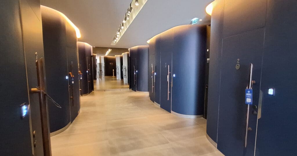 a hallway with blue doors