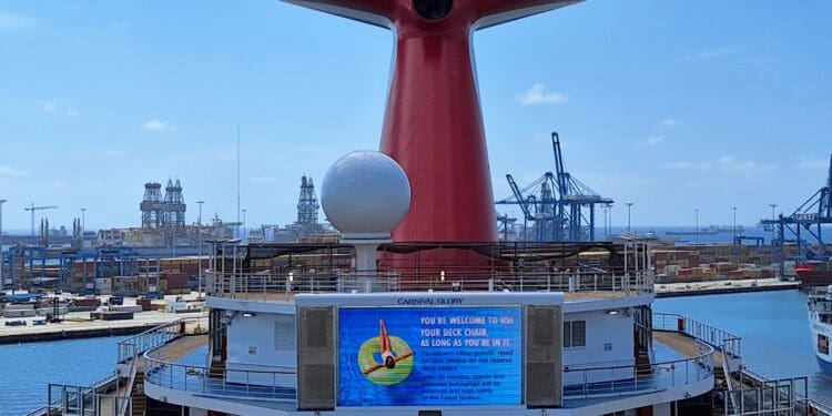 a large red and white object on a ship