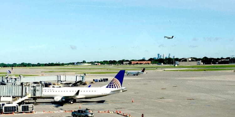 A Delta Air Lines flight takes off from runway 30R at Minneapolis–Saint Paul International Airport (MSP) in Minnesota.