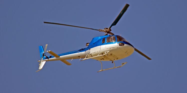 a helicopter flying in the sky