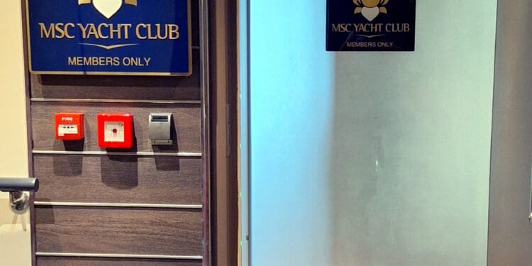 a sign on a glass door