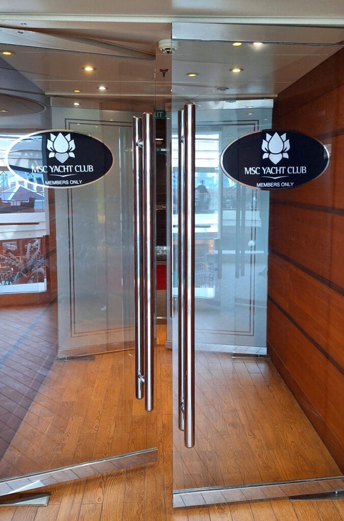 a glass door with signs on it