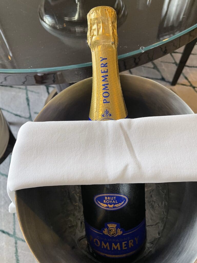 a bottle of champagne in a bucket