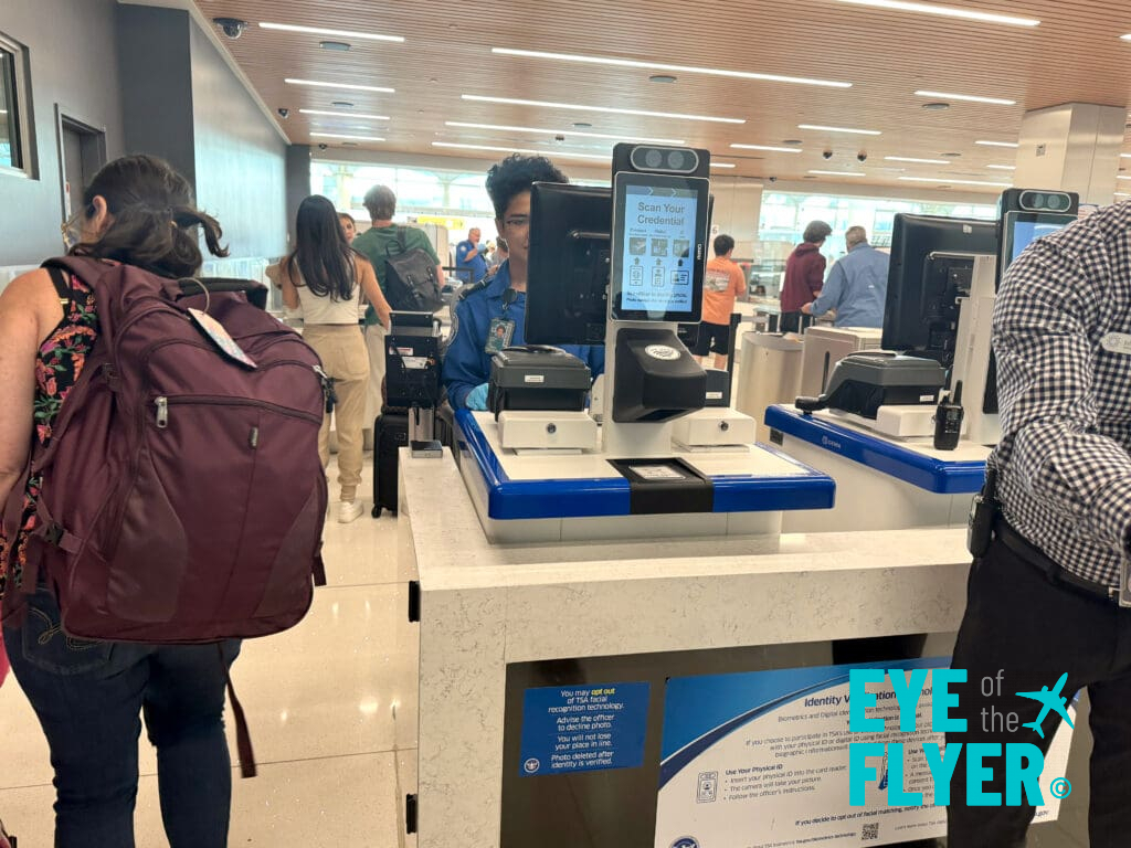 A TSA employee works the CLEAR line at Denver International Airport (DEN)