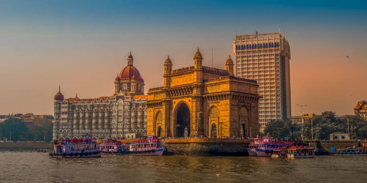 Beautiful Gateway of India near Taj Palace hotel on the Mumbai harbour with many jetties on Arabian sea near Chhatrapati Shivaji monument