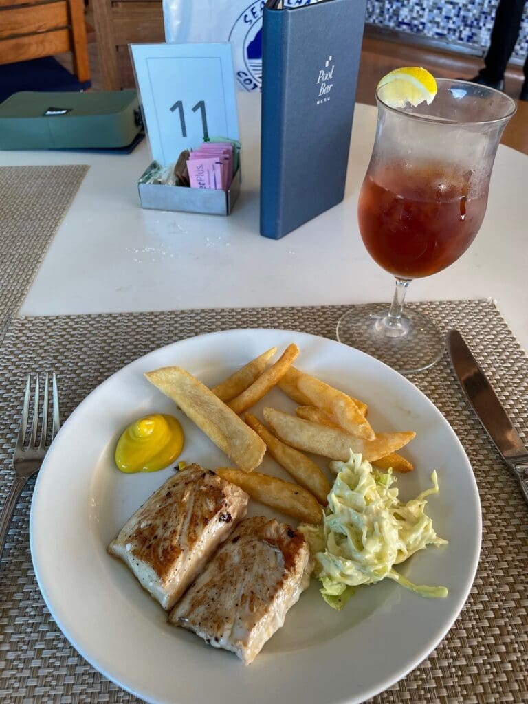 a plate of food and a drink on a table