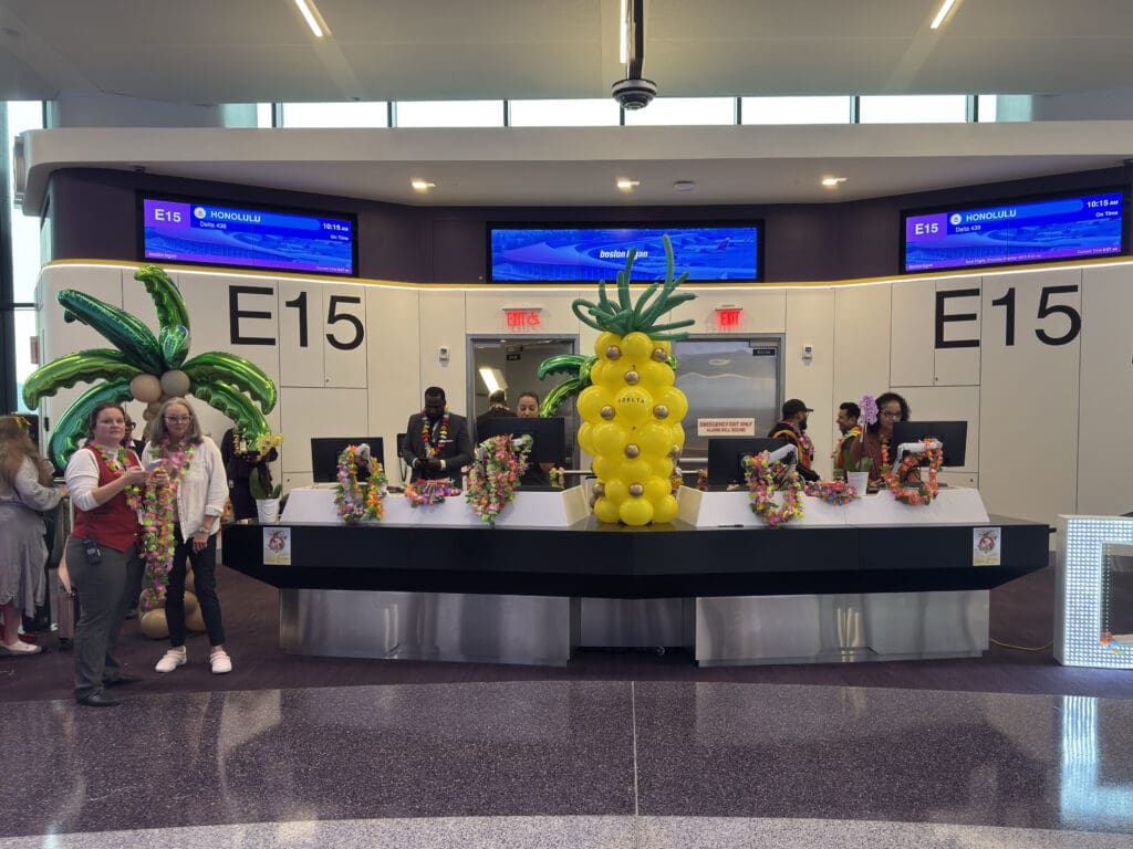 The gate E15 desk is seen during the party for Delta Air Lines’ inaugural flight from Boston (BOS) to Honolulu (HNL) at Boston Logan International Airport on Thursday, November 21, 2024. (©Eye of the Flyer)