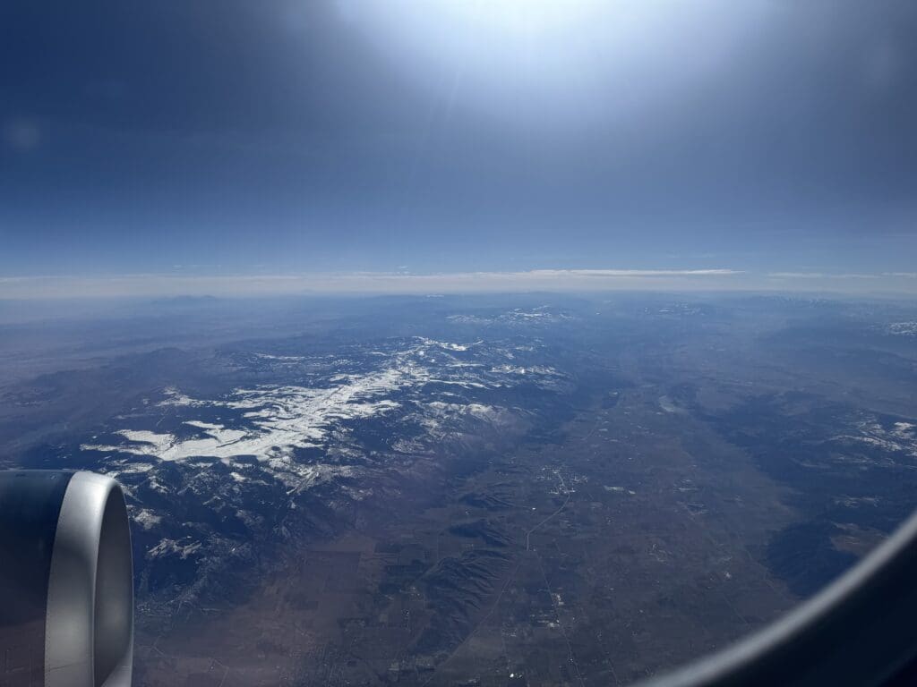 Snowy mountains seen from a Delta Air Lines flight.