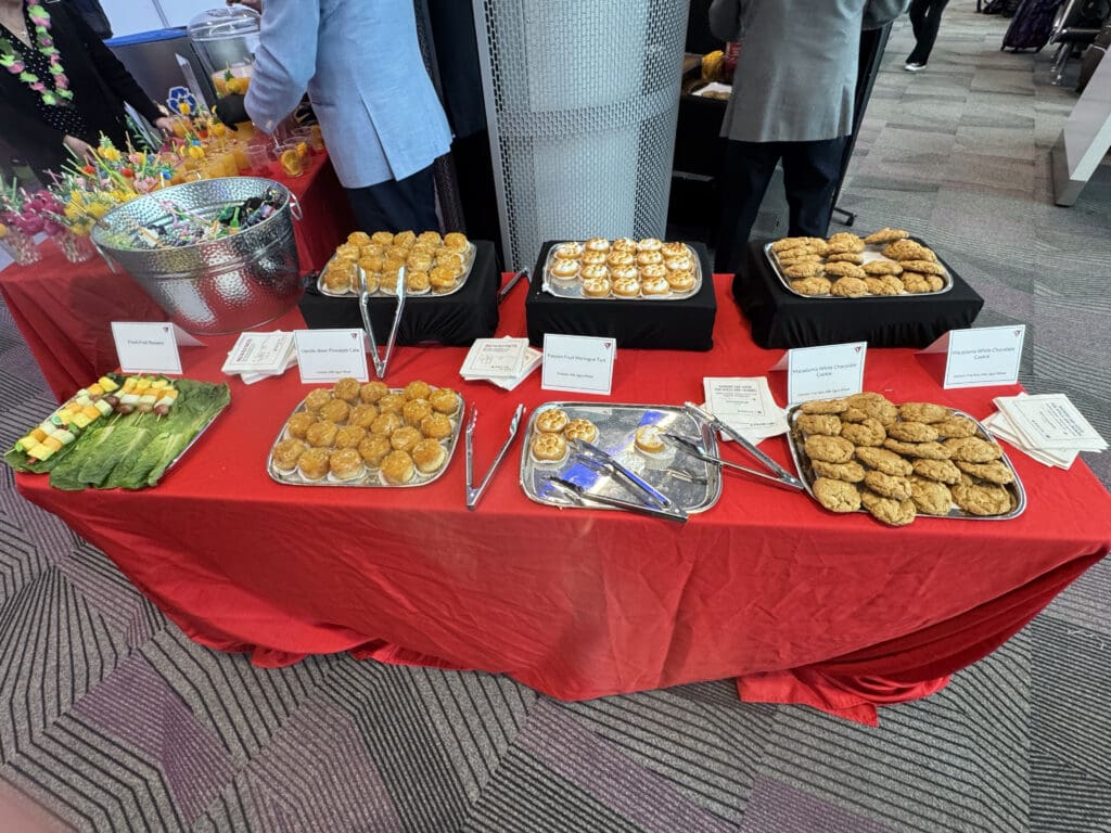 Pastries and fruit are served during the party for Delta Air Lines’ inaugural flight from Boston (BOS) to Honolulu (HNL) at Boston Logan International Airport on Thursday, November 21, 2024. (©Eye of the Flyer)