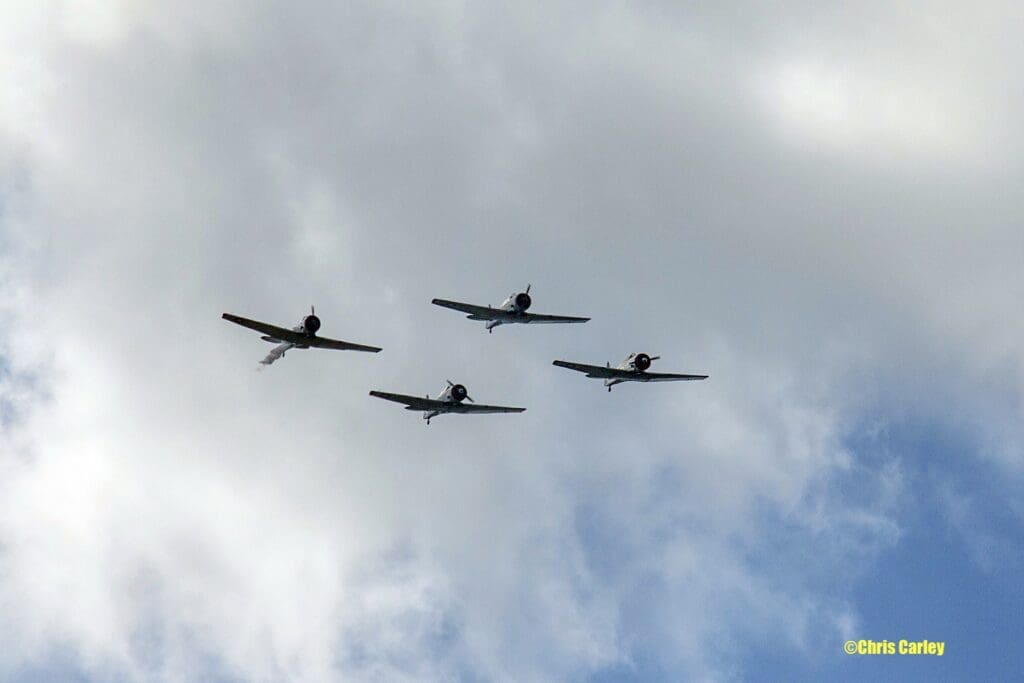 AT-6 “Texan” aircraft from the Condor Squadron based in Van Nuys, California, fly over Los Angeles on Friday, November 15, 2024.