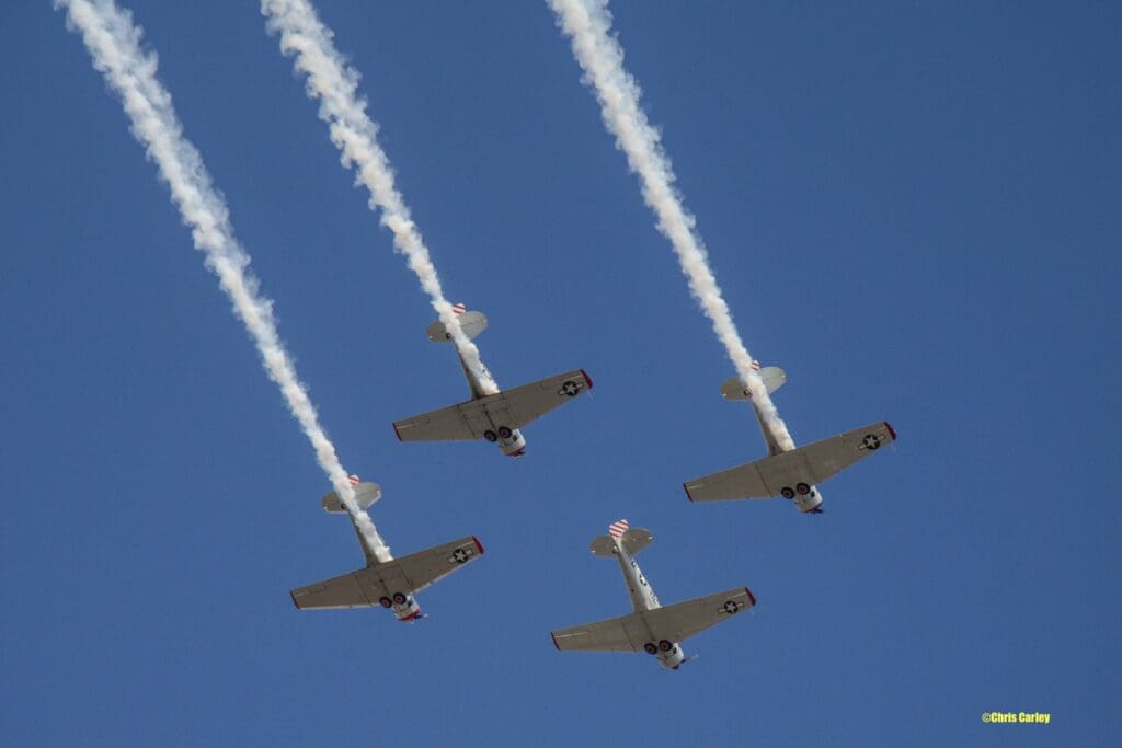 AT-6 “Texan” aircraft from the Condor Squadron based in Van Nuys, California, fly over Los Angeles on Friday, November 15, 2024.