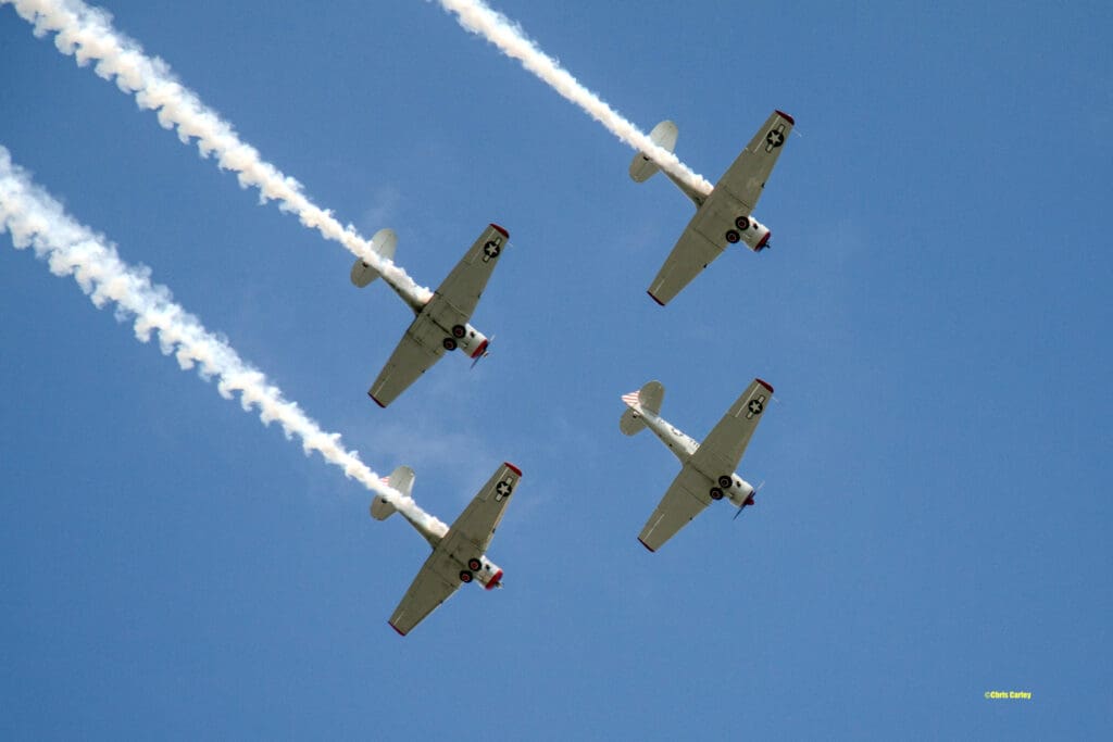 AT-6 “Texan” aircraft from the Condor Squadron based in Van Nuys, California, fly over Los Angeles on Friday, November 15, 2024.