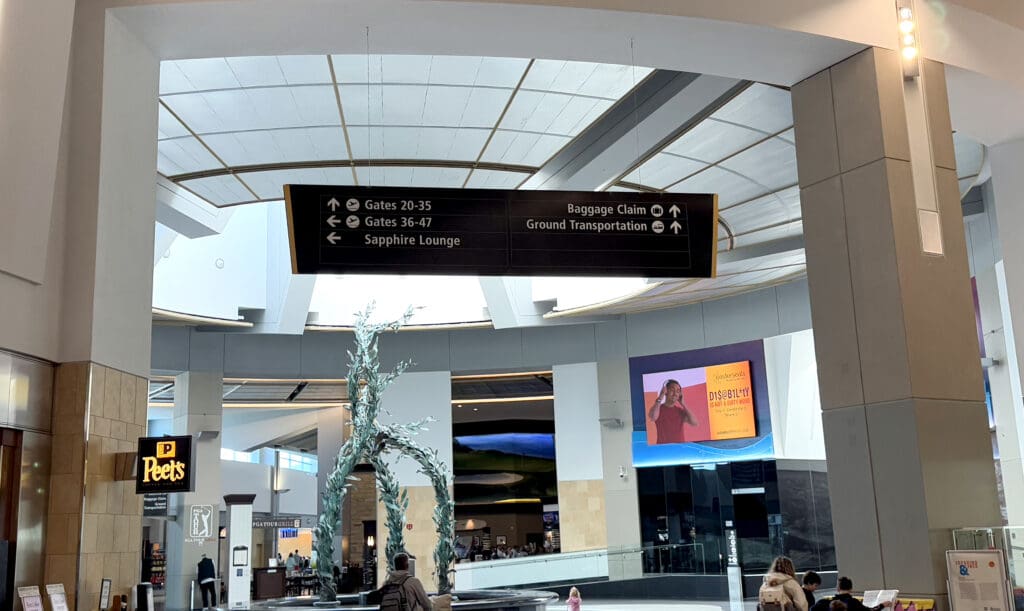 Signs direct the way to the Chase Sapphire Lounge in San Diego