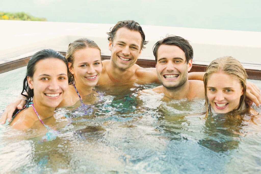 a group of people in a a hot tub
