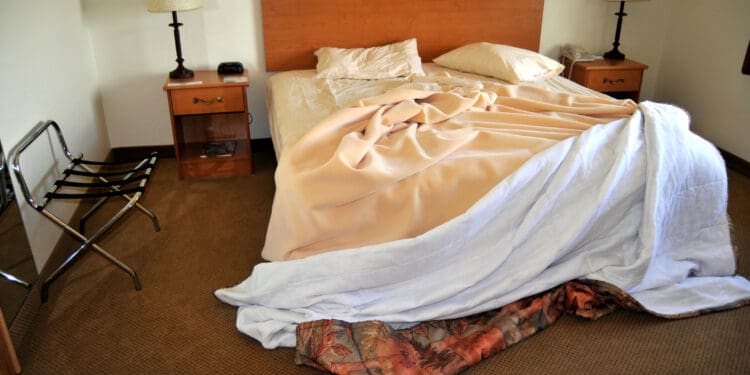 a bed with a blanket on it