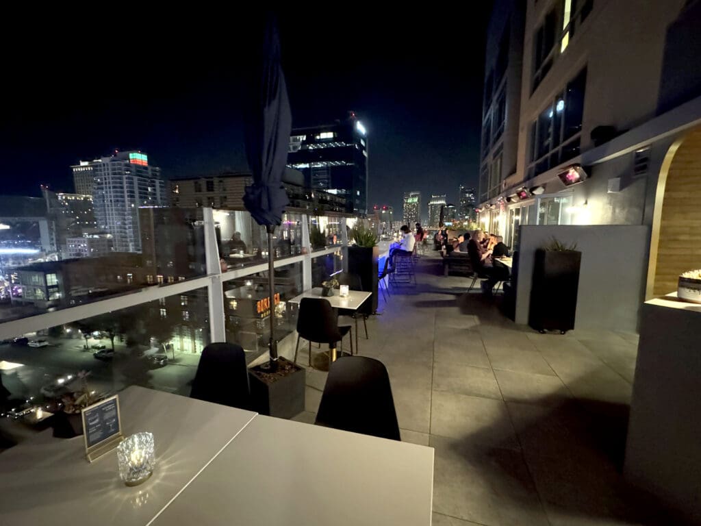 Patio at Borrego Rooftop Kitchen + Cocktails atop the Hotel Indigo in San Diego, California. Borrego participates in the Resy program.