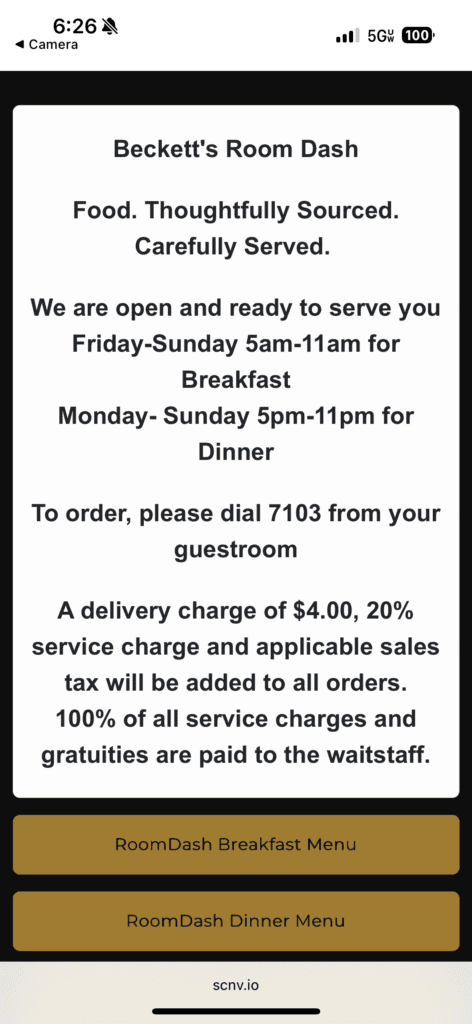 The image is a screenshot of a mobile device displaying a room service menu for "Beckett's Room Dash." It includes the following information:

- "Food. Thoughtfully Sourced. Carefully Served."
- Operating hours: Friday-Sunday 5am-11am for breakfast, Monday-Sunday 5pm-11pm for dinner.
- Instructions to order by dialing 7103 from the guestroom.
- A delivery charge of $4.00, a 20% service charge, and applicable sales tax will be added to all orders. All service charges and gratuities are paid to the waitstaff.
- Two buttons labeled "RoomDash Breakfast Menu" and "RoomDash Dinner Menu."
- The website "scnv.io" is displayed at the bottom.