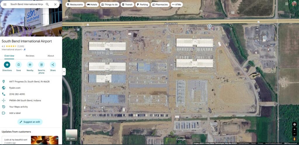 The image shows a Google Maps view of South Bend International Airport. On the left, there is a panel with information about the airport, including its name, rating, address, website, and contact number. The right side displays a satellite view of the area surrounding the airport, with visible roads, buildings, and some green spaces. Various map options and tools are visible at the top and bottom of the image.