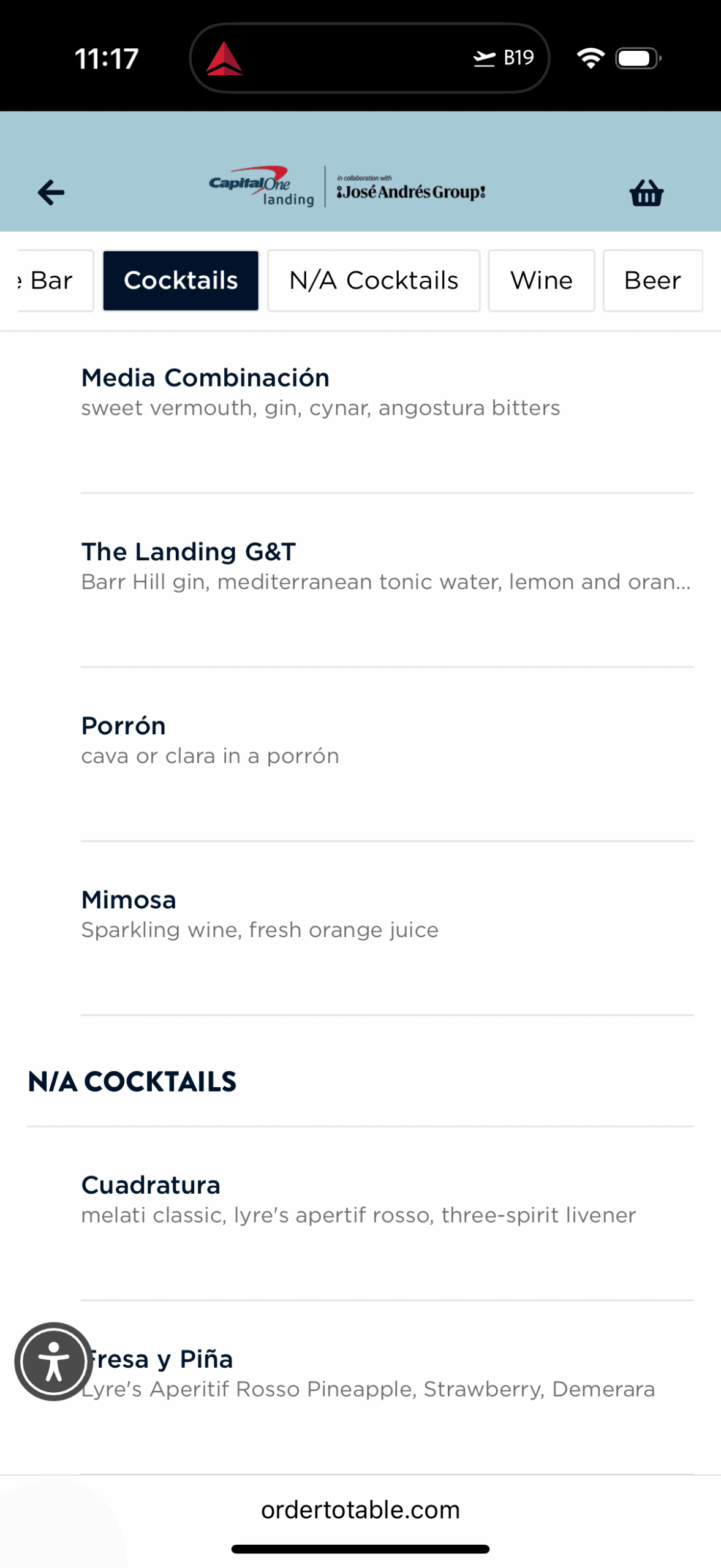 The image shows a digital menu from a collaboration between Capital One Landing and José Andrés Group. It lists cocktails and non-alcoholic cocktails. 

**Cocktails:**
1. Media Combinación - sweet vermouth, gin, cynar, angostura bitters.
2. The Landing G&T - Barr Hill gin, Mediterranean tonic water, lemon, and orange.
3. Porrón - cava or clara in a porrón.
4. Mimosa - sparkling wine, fresh orange juice.

**N/A Cocktails:**
1. Cuadratura - melati classic, Lyre’s aperitif rosso, three-spirit livener.
2. Fresa y Piña - Lyre’s Aperitif Rosso, pineapple, strawberry, demerara.

The menu is accessible via ordertotable.com.