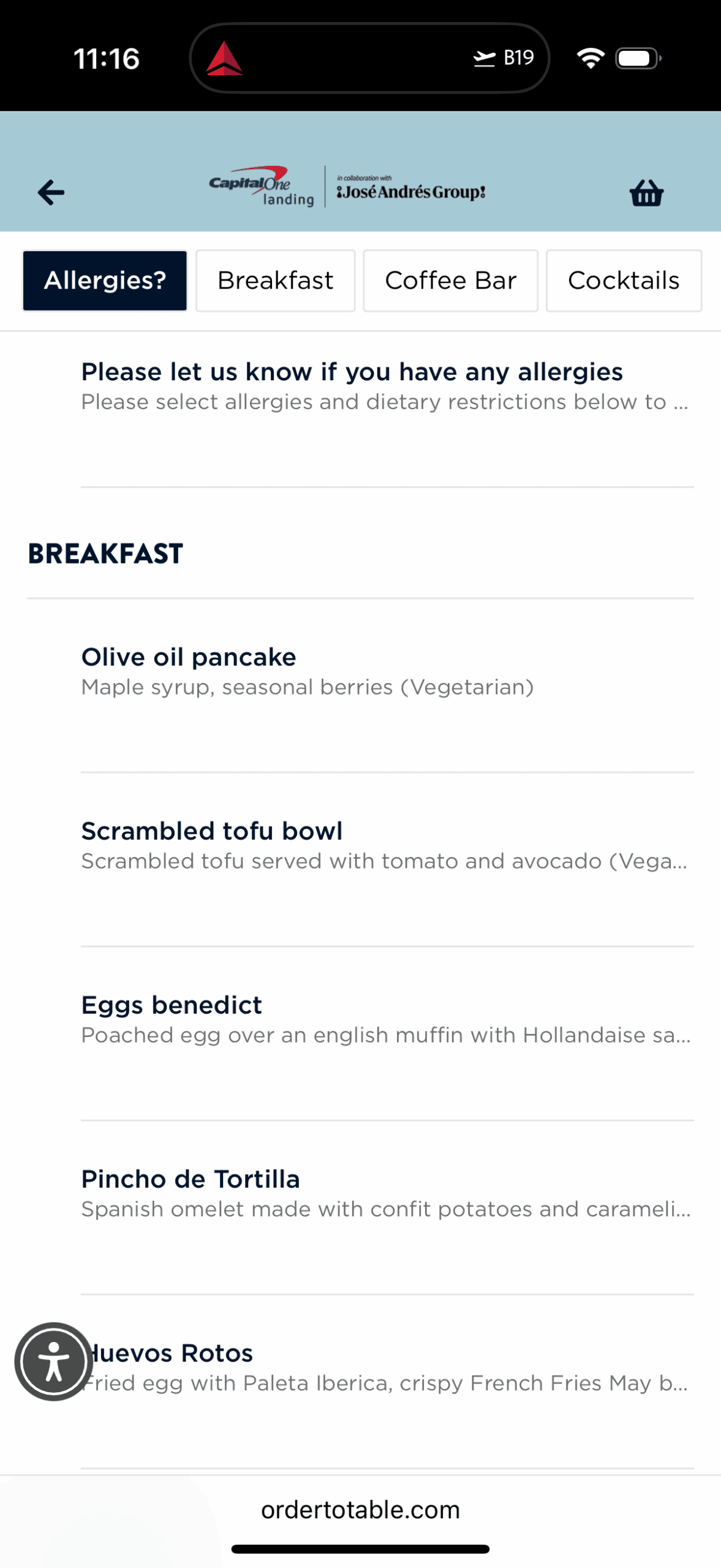 The image shows a digital menu interface from a collaboration between Capital One Landing and José Andrés Group. It includes tabs for "Allergies?", "Breakfast", "Coffee Bar", and "Cocktails". The breakfast menu lists items such as:

- Olive oil pancake with maple syrup and seasonal berries (Vegetarian)
- Scrambled tofu bowl with tomato and avocado (Vegan)
- Eggs benedict with a poached egg over an English muffin and Hollandaise sauce
- Pincho de Tortilla, a Spanish omelet with confit potatoes and caramelized onions
- Huevos Rotos, a fried egg with Paleta Iberica and crispy French fries

The top of the screen shows the time as 11:16 and a flight icon with "B19". The bottom of the screen displays "ordertotable.com".