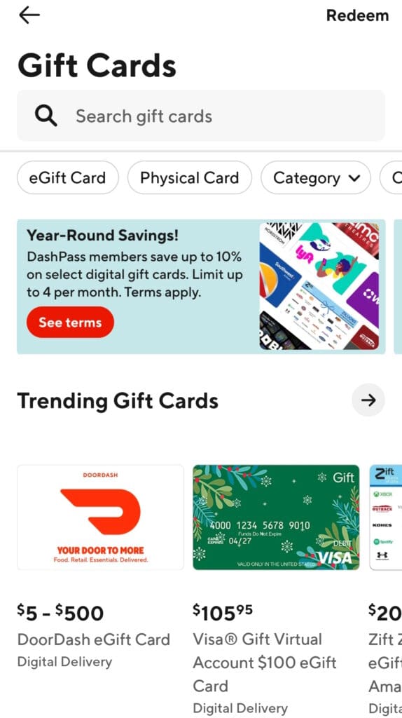 The image shows a digital interface for purchasing gift cards. At the top, there is a search bar labeled "Search gift cards" with options to filter by "eGift Card," "Physical Card," and "Category." A banner advertises year-round savings for DashPass members, offering up to 10% off select digital gift cards. Below, there is a section titled "Trending Gift Cards" featuring various options, including a DoorDash eGift Card ranging from $5 to $500, a Visa Gift Virtual Account for $105.95, and a Zift eGift Card for $200. Each card is labeled with its price and delivery method.