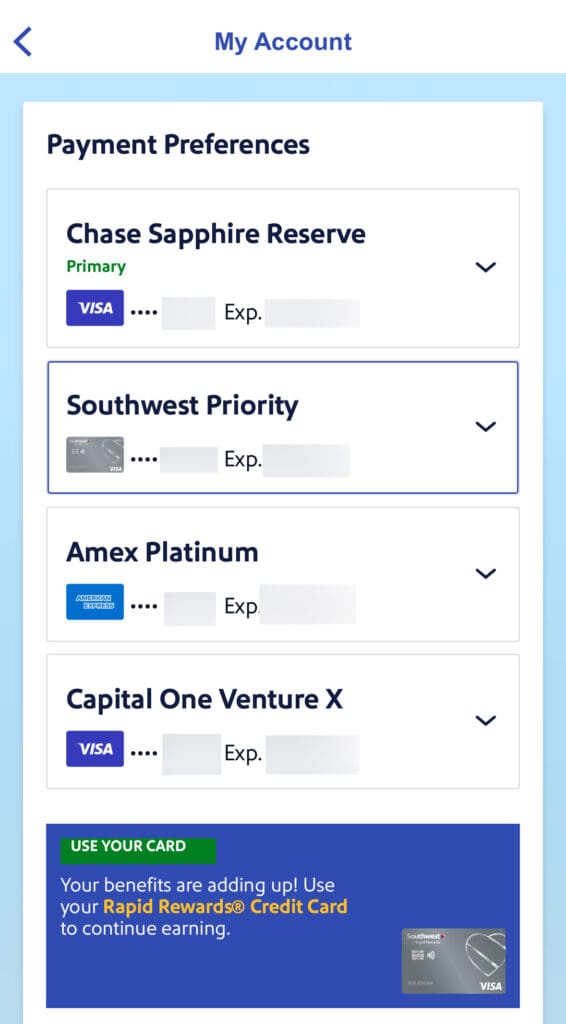 The image shows a Southwest Airlines mobile app screen titled "My Account" with a section for "Payment Preferences." It lists four credit cards: Chase Sapphire Reserve®, Southwest Priority, Amex Platinum, and Capital One Venture X. Each card entry includes a partially obscured card number and expiration date. The Chase Sapphire Reserve® is marked as "Primary." At the bottom, there is a promotional message encouraging the use of a Rapid Rewards® Credit Card to continue earning benefits, accompanied by an image of the card.