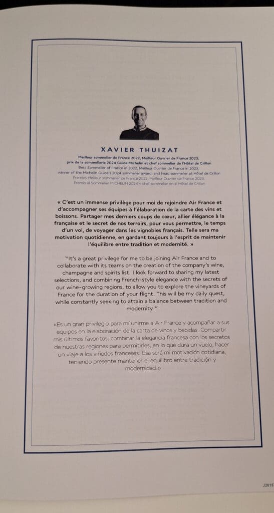 The image is a page featuring a black and white portrait of a person above the name "Xavier Thuizat." Below the name, there are titles and achievements listed in French and English, such as "Best Sommelier of France 2022" and "Meilleur Ouvrier de France 2023." The text includes a message in French, English, and Spanish about joining Air France to work on the wine and spirits list, emphasizing a balance between tradition and modernity. The page is bordered with a simple line design.