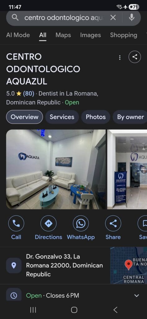 The image shows a Google search result for "Centro Odontologico Aquazul," a dental clinic in La Romana, Dominican Republic. It has a 5.0-star rating from 80 reviews and is currently open. The image includes two photos of the clinic's interior: one with white couches, a blue coffee table, and a play area for children, and another showing the clinic's entrance with a sign displaying the clinic's logo. Contact options like call, directions, and WhatsApp are visible, along with the address and opening hours.