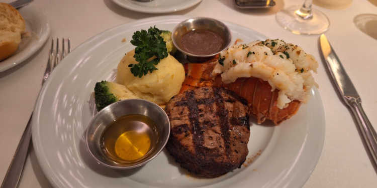 a plate of food with sauces and a fork
