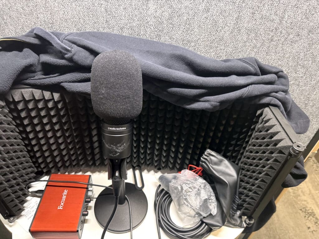 A voiceover setup in a Delta Sky Club phone booth